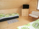 Domek drewniany nowy - sypialnia większa