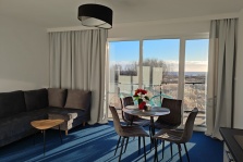 Apartament nr 3 - salon z narożnikiem i aneksem kuchennym